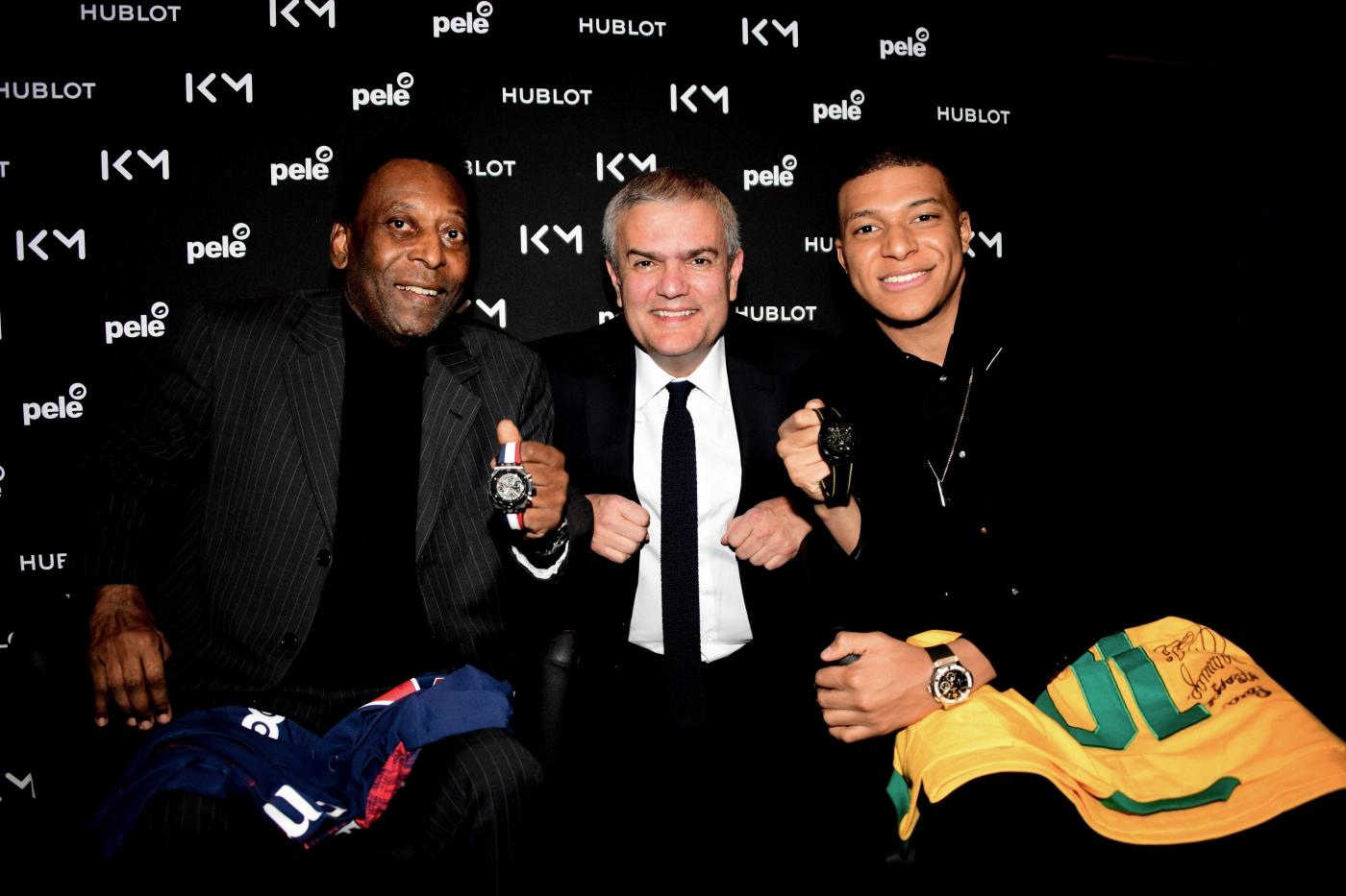 Pelé, Ricardo Guadalupe and Kylian Mbappé holding Hublot watches