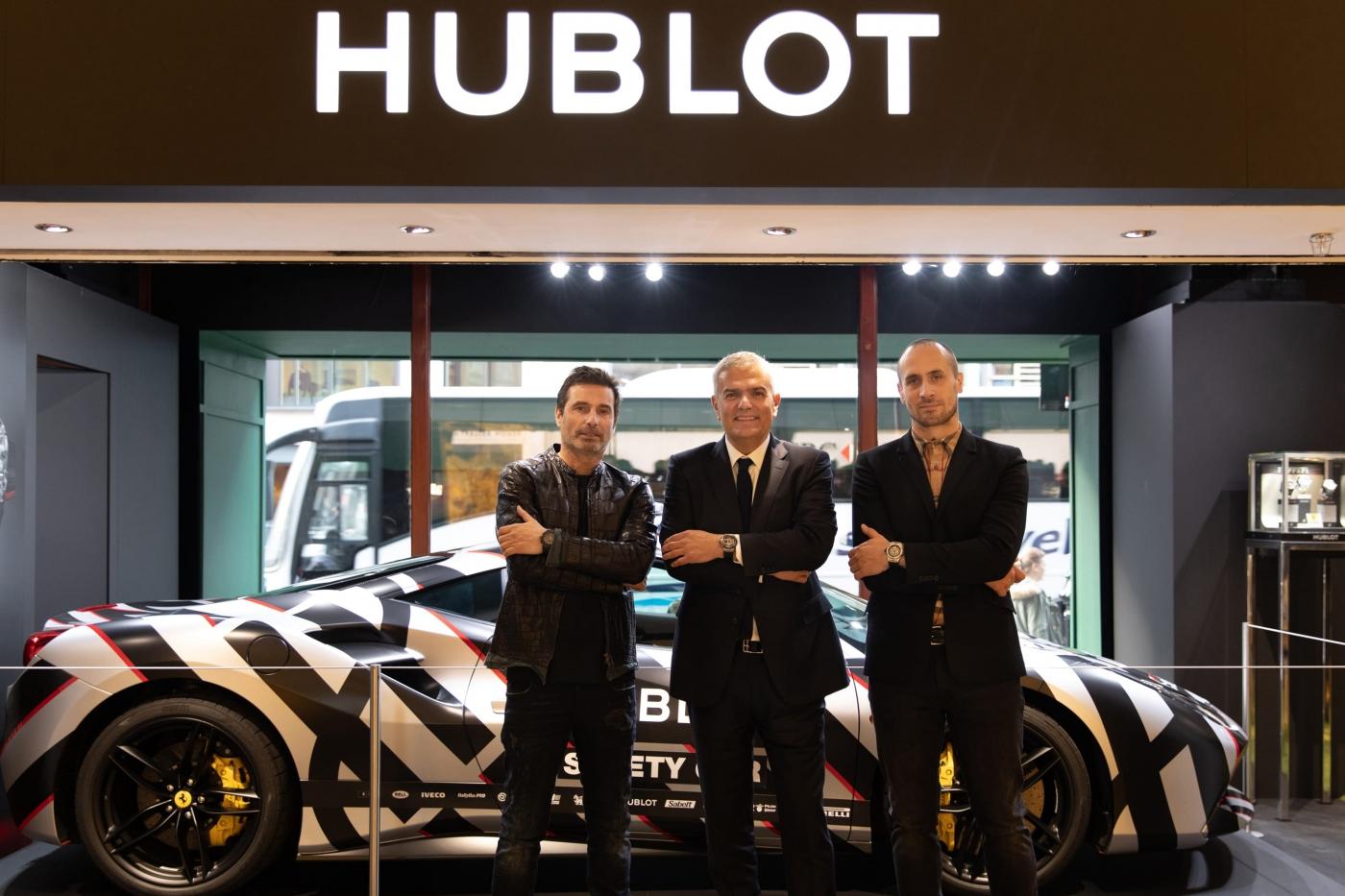 Ricardo Guadalupe, Maxime Buchi and Richard Orlinski with Ferrari car