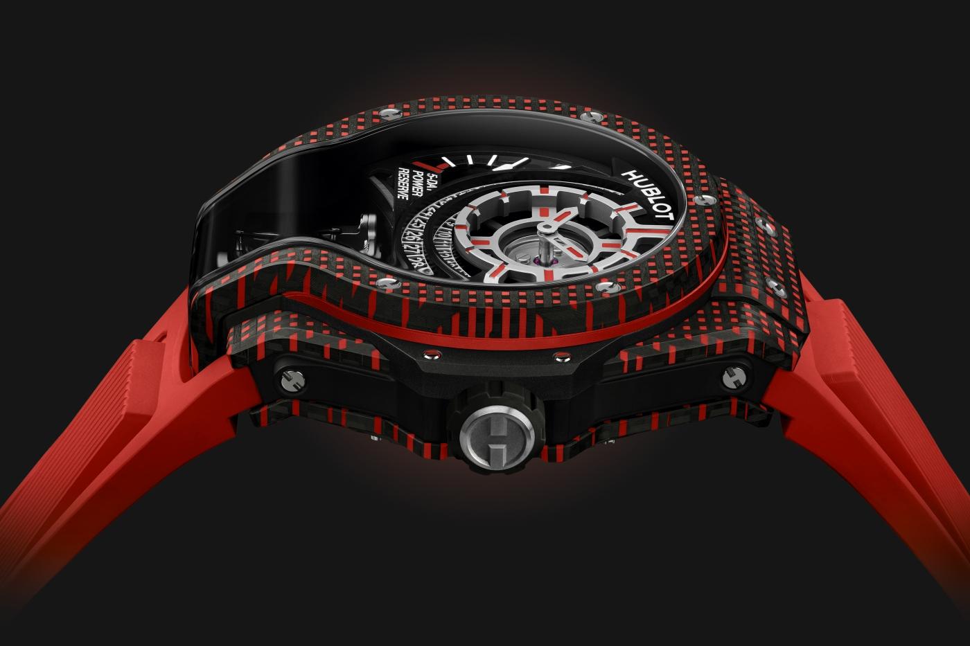 big bang mp-09 tourbillon bi axis red 3d carbon 49 mm shot
