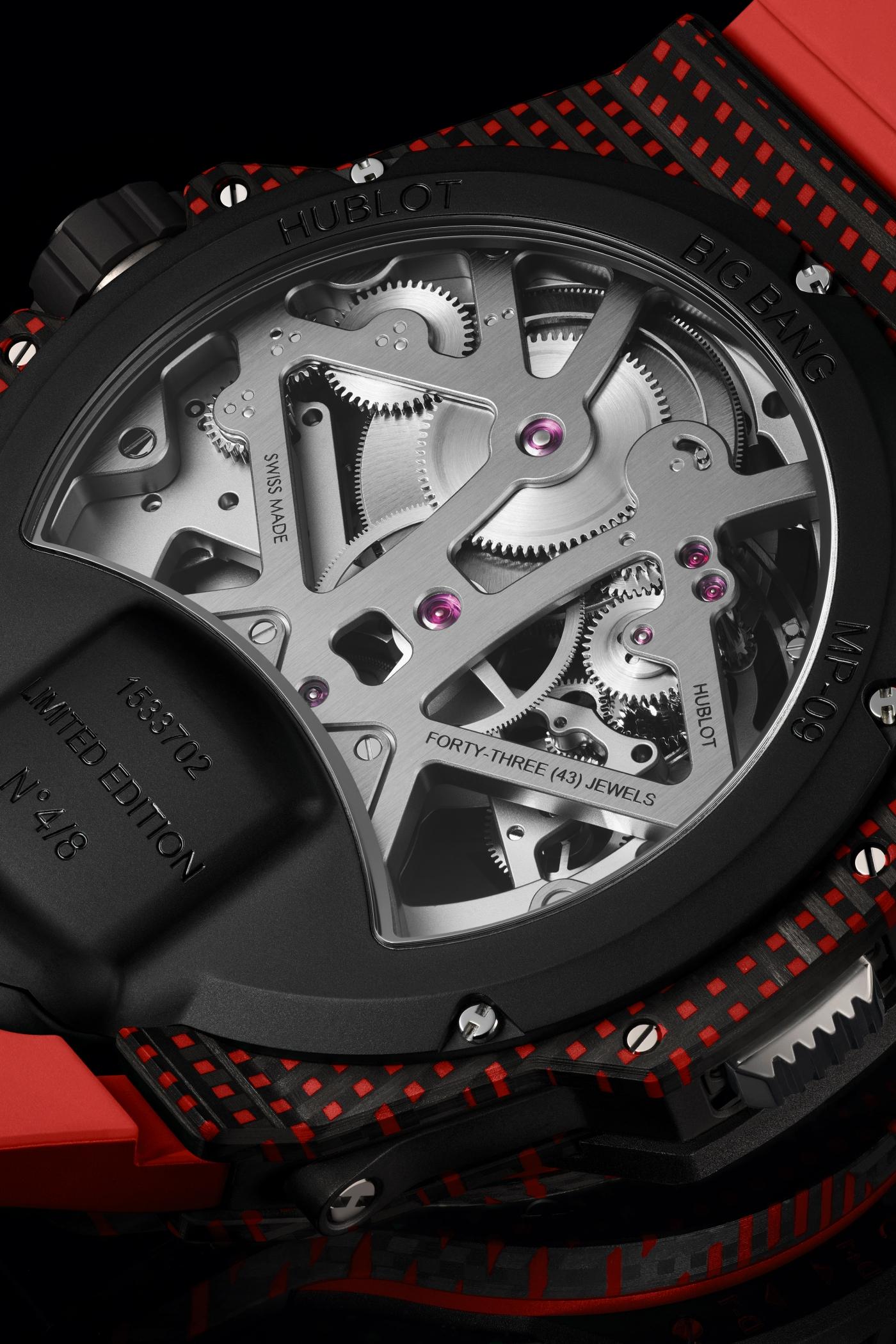 big bang mp-09 tourbillon bi axis red 3d carbon 49 mm shot